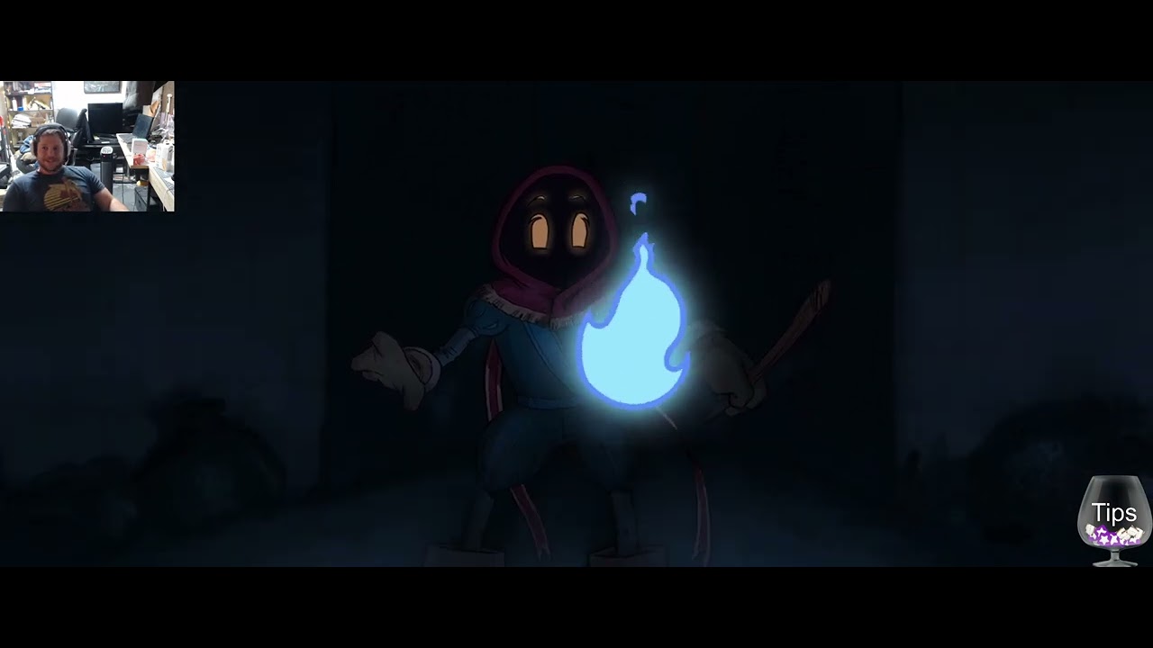 Dark Guayota game scene: a hooded, cloaked figure holds a glowing blue flame; small editor webcam in the corner